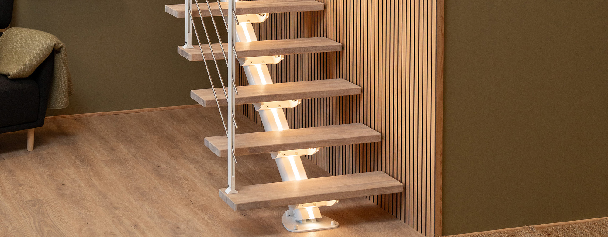 Sydney Staircase with white Design Banister and oiled oak treads in a modern living room.