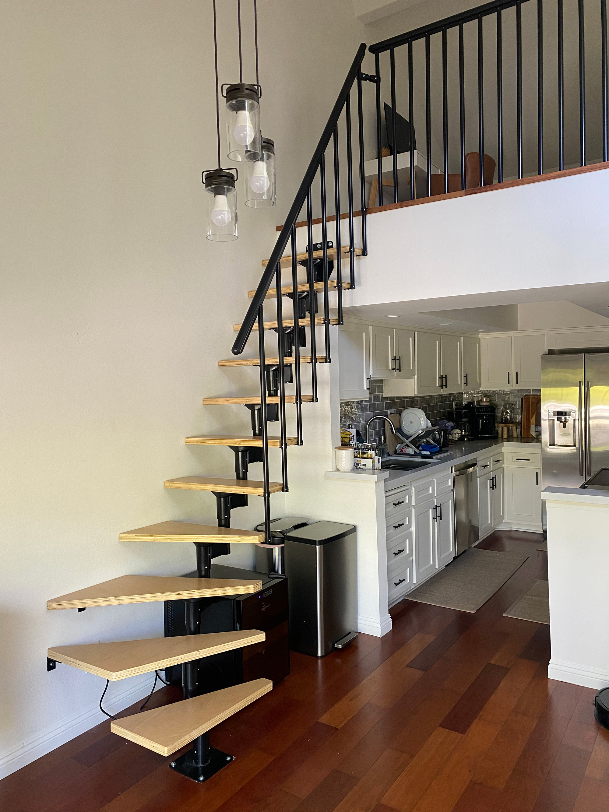 Kitchen with upstair room space shown with stair