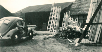 Historical image with DOLLE ladders in the back ground