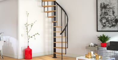 Black Spiral staircase in living room giver access upstairs